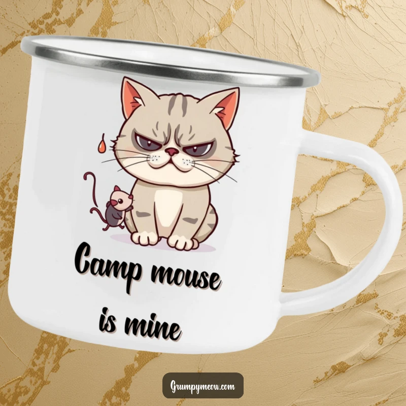 Funny camping mug featuring a grumpy cat playfully swatting at a dangling toy mouse, ready for outdoor fun and games.