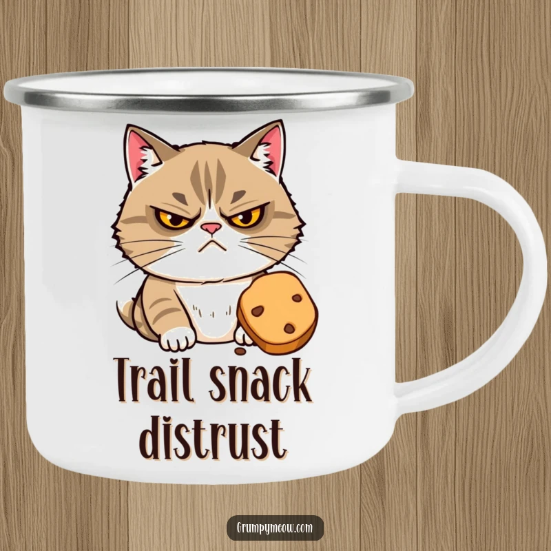 Funny camping mug featuring a grumpy cat with narrowed eyes suspiciously eyeing a tempting treat, ready for outdoor snack enjoyment.
