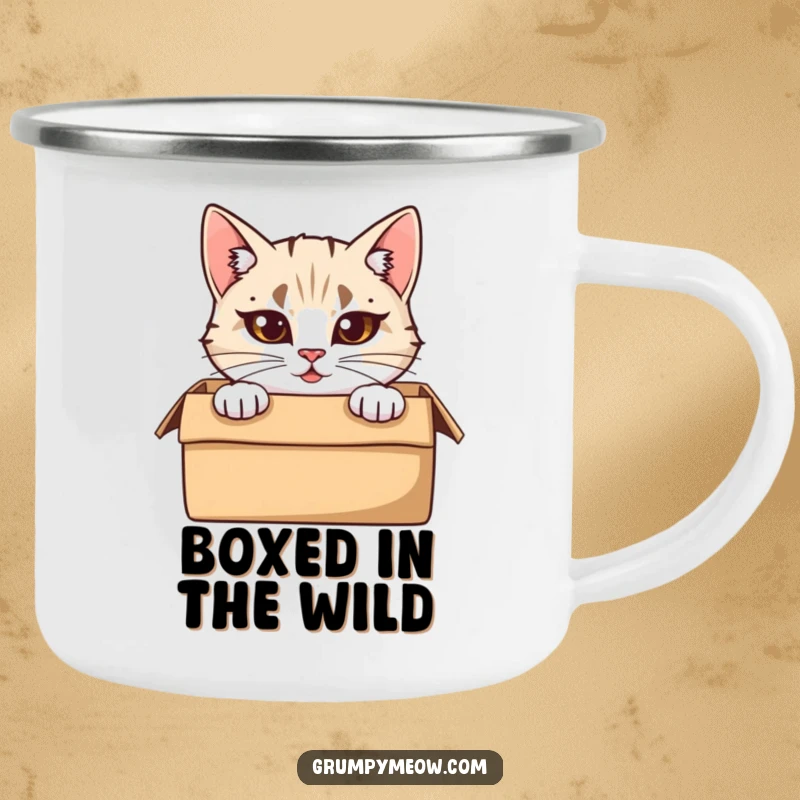 Funny Camping Mug: A cat with furrowed brows peeks from a cardboard box, ideal for outdoor activities with a humorous touch.