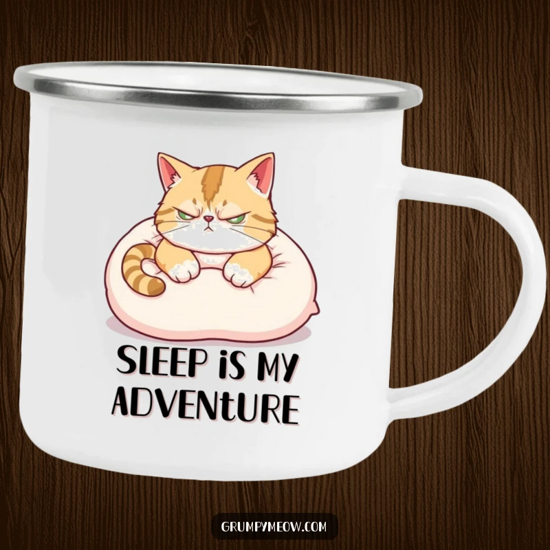 Funny Camping Mug: A scowling cat attempts to nap on a pillow, ear twitching, ideal for grumpy outdoor mornings.