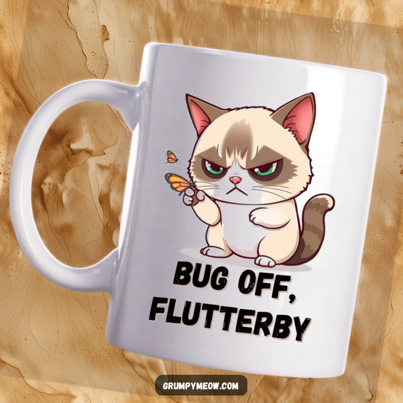 Funny grumpy cat disdainfully batting away a playful butterfly with one paw, perfect for cat lovers, a hilarious funny gift.