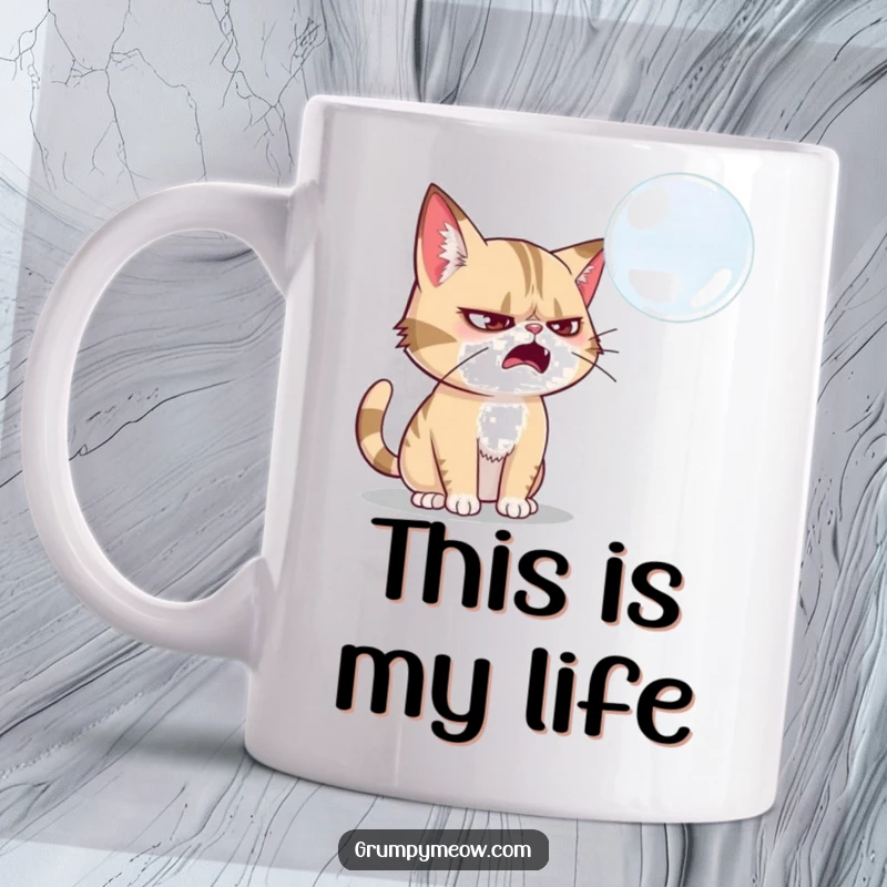 Funny grumpy cat mug, mid-swat at a floating soap bubble, looking intensely focused, a perfect gift for cat lovers.