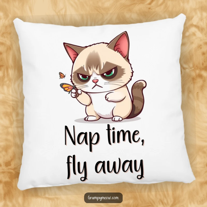 Funny plush pillow featuring a grumpy cat disdainfully batting away a butterfly with one paw, a soft funny gift.