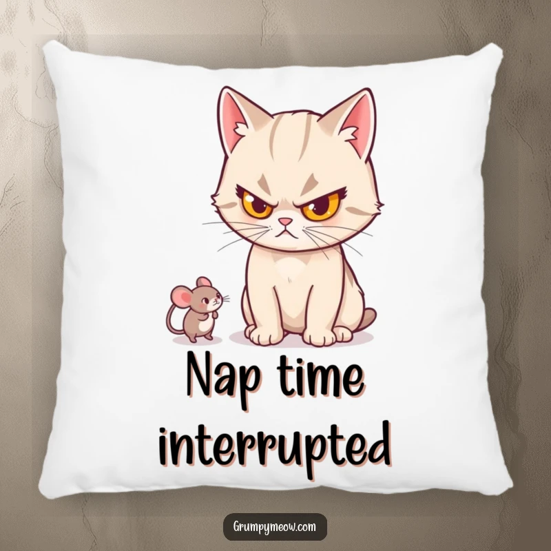 Funny cat pillow with a depiction of a cat with a stern expression, batting a small mouse toy, embodying playful seriousness.