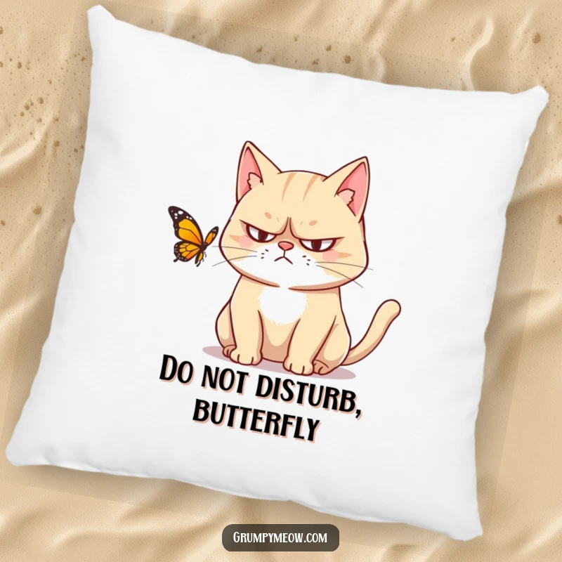 Funny pillow featuring a grumpy cat with narrowed eyes cautiously observing a butterfly, offering comfort and a humorous visual.