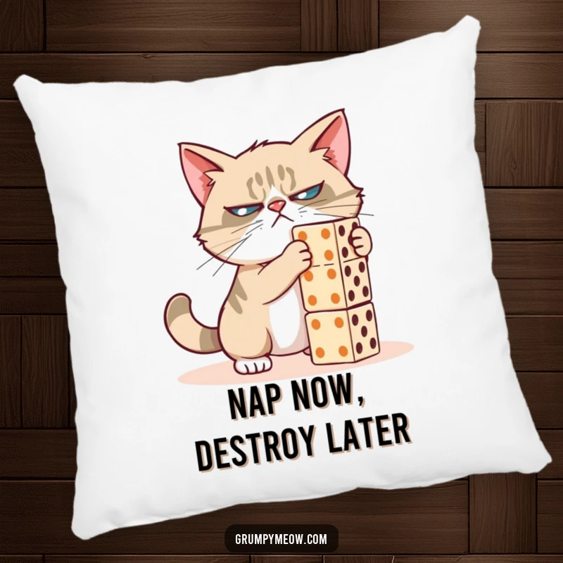 Funny grumpy cat pillow, poised to topple dominoes, with a signature skeptical expression, a great funny gift for comfort.