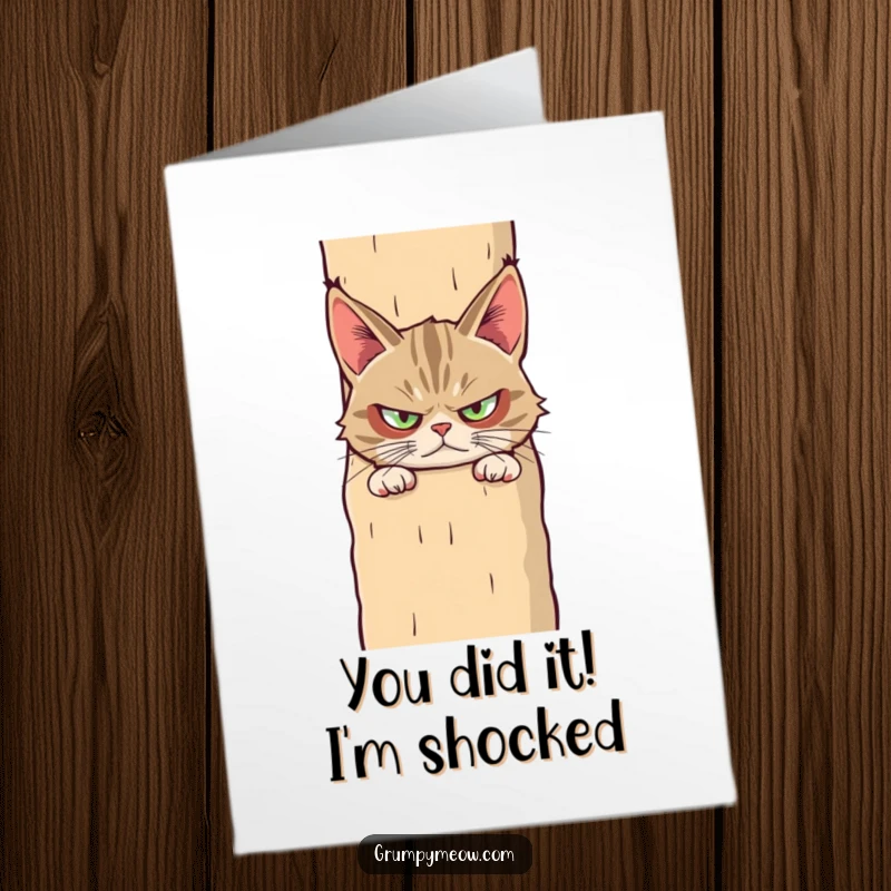 Funny Free Printable Congratulatory Card: Grumpy Cat peeking suspiciously from behind a giant scratching post, a truly unique greeting.