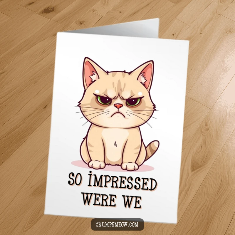 Funny Free Printable Congratulations Card: Grumpy cat is utterly unimpressed by a shiny object, perfect for ironic celebrations.