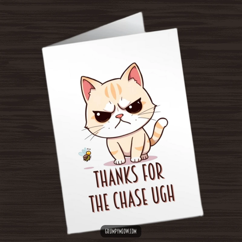 Funny Free Printable Thank You Card: A grumpy cat half-heartedly paws at a buzzing fly, signifying a thank you delivered with minimal excitement.