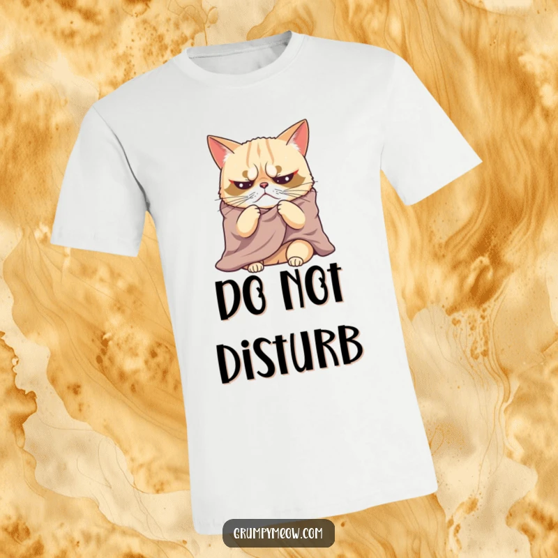 Funny t-shirt showcasing a grumpy cat dramatically sighing while wrapped in a blanket, radiating relatable, humorous coziness.