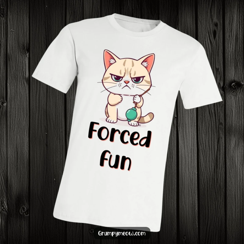 Funny T-Shirt depicting a grumpy cat looking unimpressed, with a nonchalant paw swatting at a dangling toy, showcasing feline indifference.